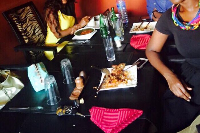 Nana Aba Anamoah in yellow, Benny Blanco and Ama K Abebrese having lunch