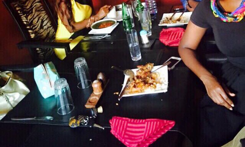 Nana Aba Anamoah in yellow, Benny Blanco and Ama K Abebrese having lunch