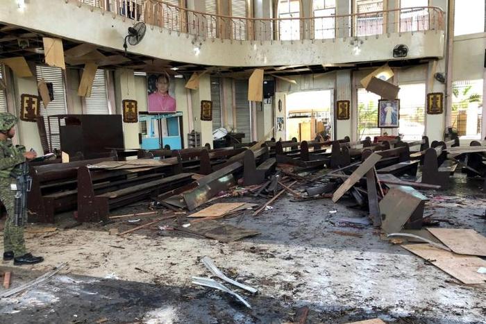 The door, pews and glass windows of Mount Carmel Cathedral were blown off, military photos showed