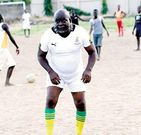 Kofi Adjorlolo challenges Black Stars skipper Asamoah Gyan in his comeback movie "Ghana Must Go".