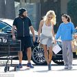 From left to right - Rick Salomon, Pamela Anderson and his two daughters