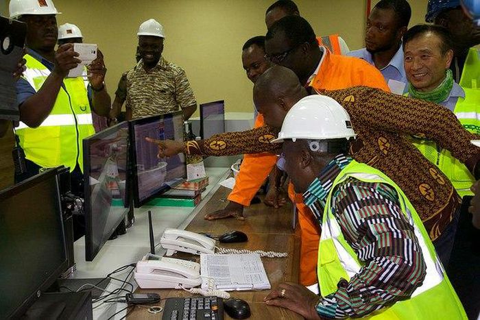President John Mahama with some officials of TICO