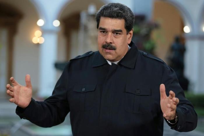 There is a mood of simmering defiance in some quarters of Caracas, where supporters of Venezuela's President Nicolas Maduro are angered by international backing for Juan Guaido, opposition leader who has declared himself interim president