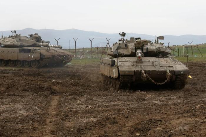 Israeli tanks deploy in the Israeli-annexed Golan Heights on January 20, 2019