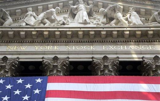 The American flag hangs outside the New York Stock Exchange, July 6, 2015