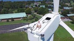 Drone catches man on top of a 200ft wind turbine