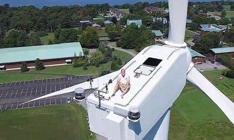Drone catches man on top of a 200ft wind turbine