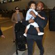 Kanye West arrives LAX with Kim Kardashian and North West