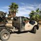 Forces loyal to Libyan strongman Khalifa Haftar man pickup trucks in Benghazi on October 24, 2018