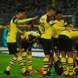 Marco Reus was buried by celebrating team-mates as Dortmund won