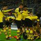 Marco Reus was buried by celebrating team-mates as Dortmund won