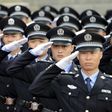 China calls on police to use guns lawfully after shootings