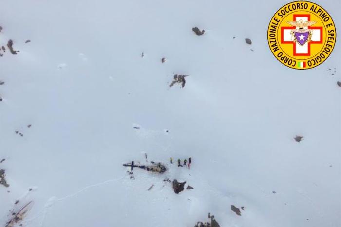 Five people died when a helicopter collided with a light aircraft in the Alps