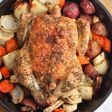 Roasted chicken, seasoned with salt, fresh ground pepper, and thyme, and cooked with root vegetables.