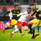 Borussia Dortmund midfielder Julian Weigl (R) thwarts RB Leipzig's French forward Jean-Kevin Augustin (C) during an outstanding display from the Germany international, who played out of position at centre-back, in last Saturday's 1-0 away win.