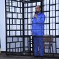 Saif al-Islam Gaddafi, son of late Libyan leader Muammar Gaddafi, attends a hearing behind bars in a courtroom in Zintan, June 22, 2014 . REUTERS/Stringer