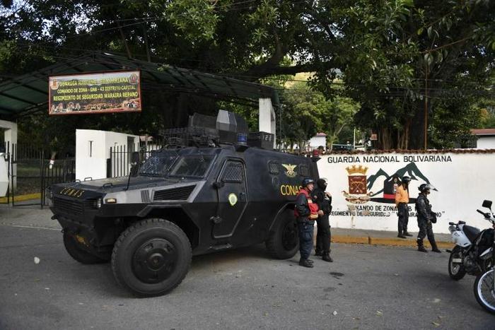Armored cars in front of Cotiza Bolivarian National Guard headquarter in Caracas, Venezuela, after an uprising