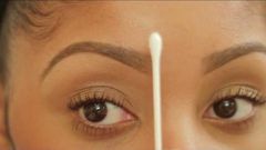 Perfectly defined brows frame the eyes