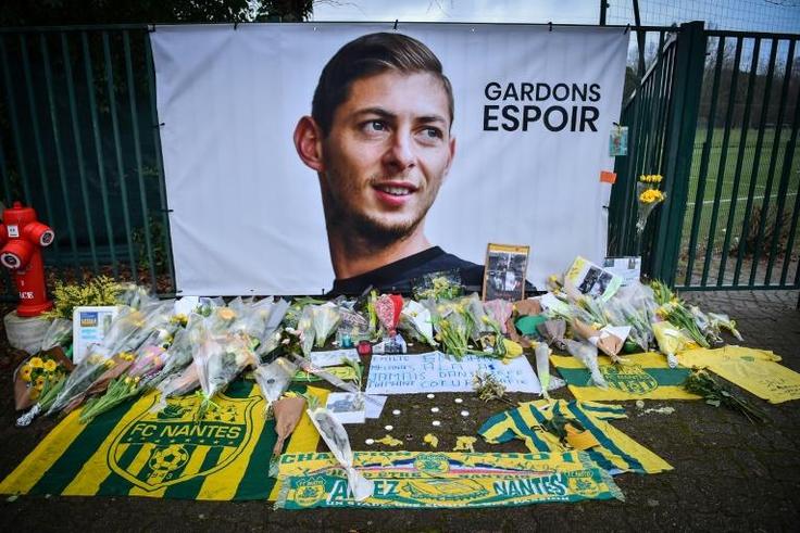 Fans place tributes to Argentinian forward Emiliano Sala outside the Nantes training ground in France. The player had signed for Cardiff City in the English Premier League and his plane went missing on a flight to join his new club