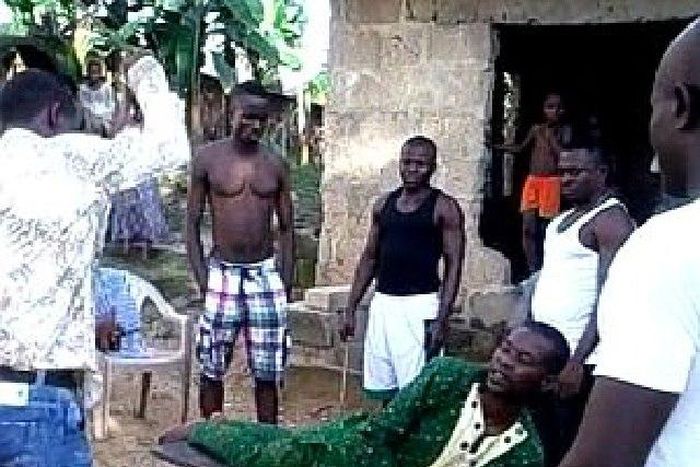 Man being caned for a crime