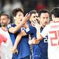 Iran forward Sardar Azmoun (2nd-R) confronts Japan midfielder Genki Haraguchi (L) during the 2019 AFC Asian Cup semi-final football match between Iran and Japan at the Hazza Bin Zayed Stadium in Al-Ain on January 28, 2019