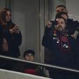 Italy's Interior Minister and Deputy Prime Minister Matteo Salvini (C) is a passionate AC Milan fan.