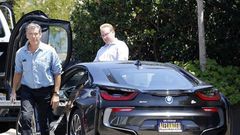007 star, Pierce Brosnan acepting his newly purchased BMW