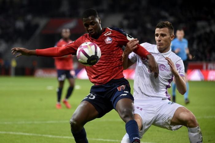 Fode Ballo-Toure (L) in action for Lille last month -- he has joined Monaco on a four-and-a-half-year deal