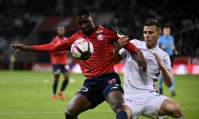 Fode Ballo-Toure (L) in action for Lille last month -- he has joined Monaco on a four-and-a-half-year deal