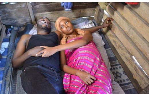 Deyemi Okanlawon and Yvonne Nelson on set