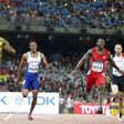 Usain Bolt of Jamaica (L) crosses the finish line ahead of Justin Gatlin (2nd R) from the U.S., Zharnel Hughes of Britain (2nd L) and Ramil Guliyev of Turkey in the men's 200m final during the 15th IAAF World Championships at the National Stadium in Be...