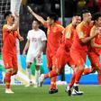 Lei Wu celebreates scoring one of his two goals in China's Asian Cup win over the Philippines
