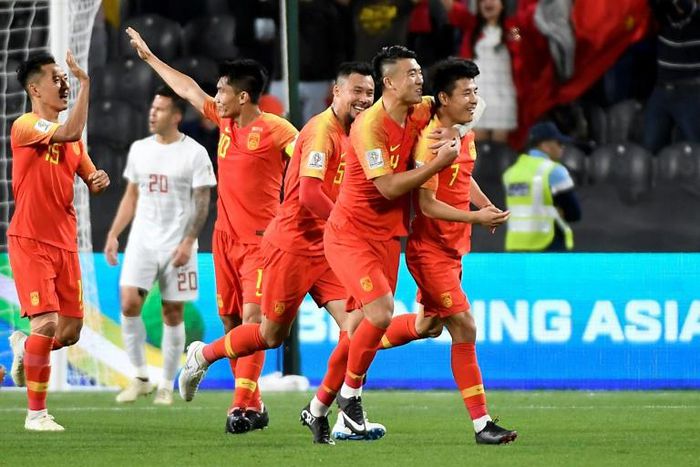 Lei Wu celebreates scoring one of his two goals in China's Asian Cup win over the Philippines