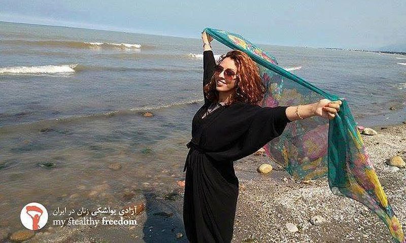 Iranian women removing their hijab