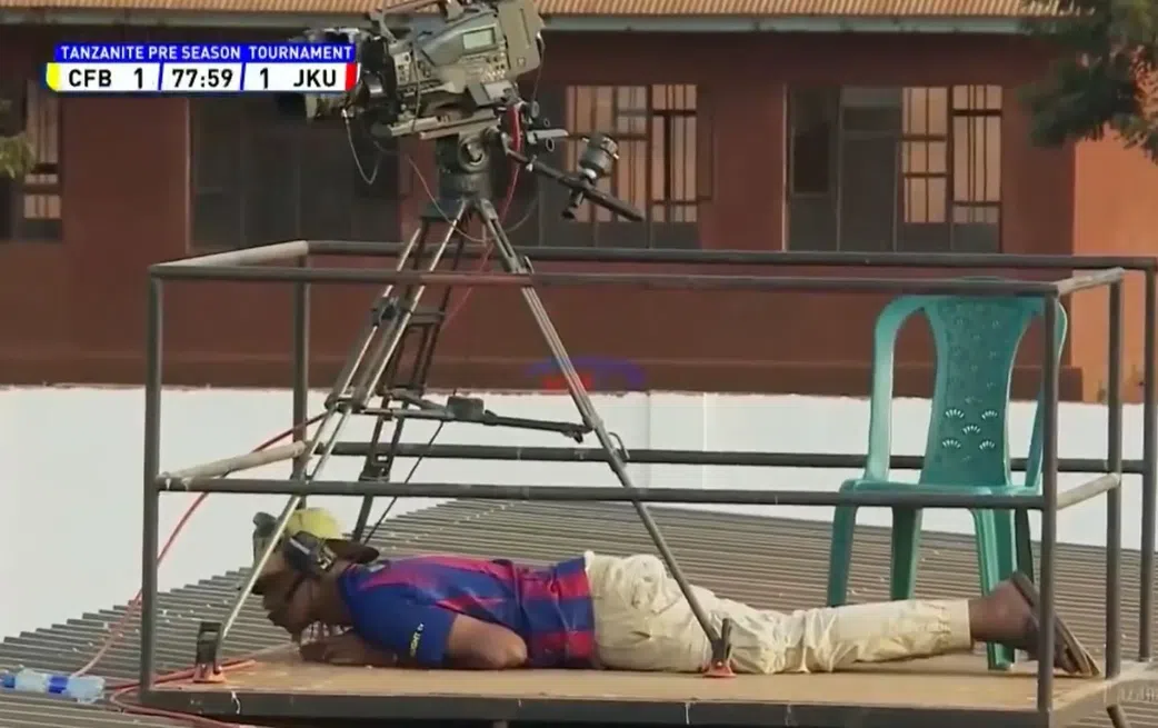 Camera crew hide for cover