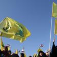 Hezbollah's flag features a Kalashnikov assault rifle