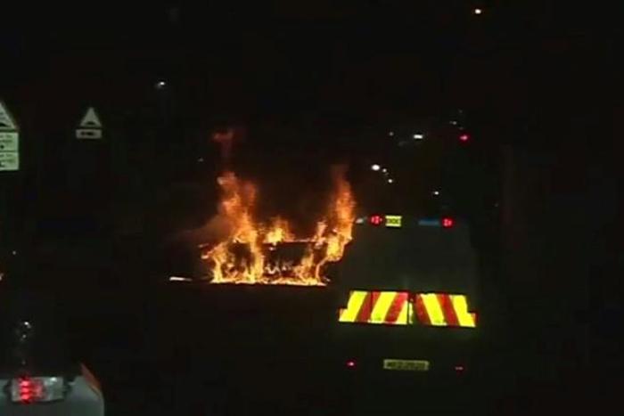 A still image from CCTV video footage released by the Police Service of Northern Ireland (PSNI) on April 20, 2019 shows a vehicle burning in violent disorder during which journalist Lyra Mckee was shot dead in Derry (Londonderry) in northern Ireland on...