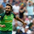 South Africa's Imran Tahir celebrates taking the wicket of England captain Eoin Morgan