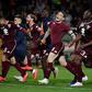 What a win: Torino's players celebrate after their 2-0 win over AC Milan