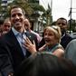 Venezuelan opposition leader and self declared acting president Juan Guaido greets supporters at a demonstration called by supporters in the transportation sector, in Caracas on February 20, 2019