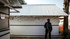 A police officer guarding an Ebola Treatment Centre in Butembo, the epicentre of DR Congo's latest Ebola outbreak