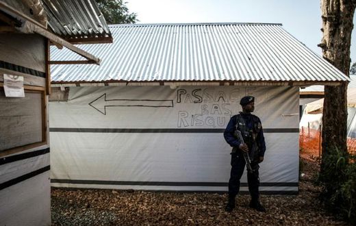 A police officer guarding an Ebola Treatment Centre in Butembo, the epicentre of DR Congo's latest Ebola outbreak