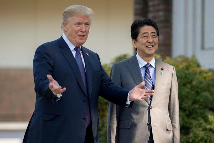 US President Donald Trump arrives for lunch with Japan's Prime Minister Shinzo Abe at the Kasumigaseki Country Club golf course outside Tokyo in November 2017