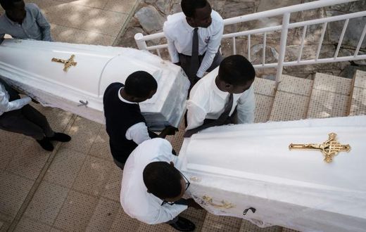 Eighty-one white coffins containing the remains of 84,437 victims of the 1994 mass killings were buried at the Nyanza Genocide Memorial in Kigali