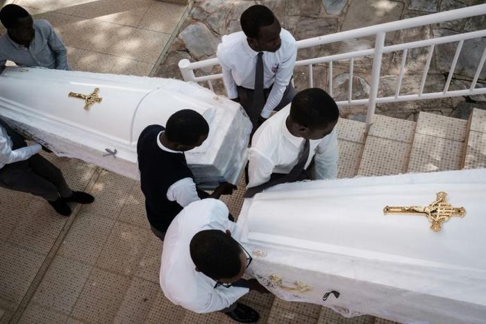 Eighty-one white coffins containing the remains of 84,437 victims of the 1994 mass killings were buried at the Nyanza Genocide Memorial in Kigali