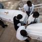 Eighty-one white coffins containing the remains of 84,437 victims of the 1994 mass killings were buried at the Nyanza Genocide Memorial in Kigali