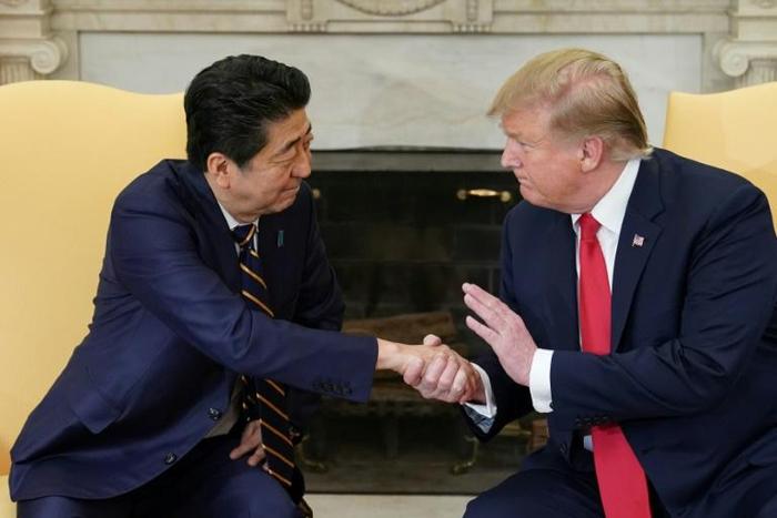 US President Donald Trump takes part in a bilateral meeting with Japan's Prime Minister Shinzo Abe in the Oval Office of the White House on April 26 of this year