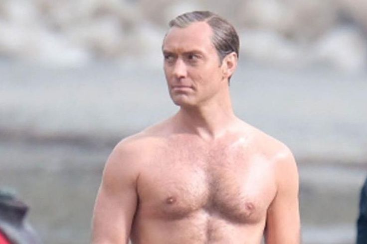 Jude Law's Beach Pope Bod Ignites Online Debate