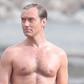 Jude Law's Beach Pope Bod Ignites Online Debate