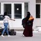 The 26 women placed under house arrest are among a group of around 30 flown back to Pristina alongside 74 children and four men